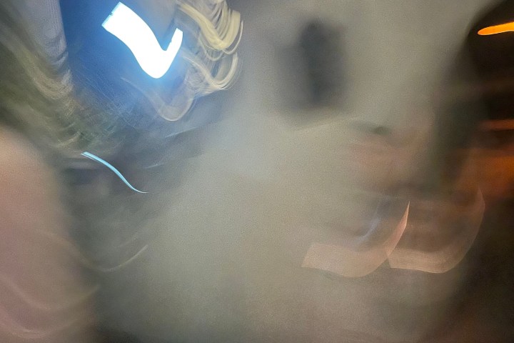 Blurred abstract light and shapes in motion.